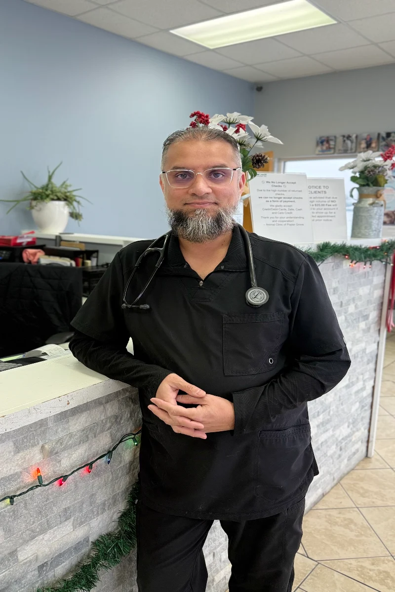 Dr. Malik, veterinarian and owner of Animal Clinic of Poplar Grove